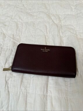 kate spade Leather Zip Wallet in Deep Plum with Gold Hardware